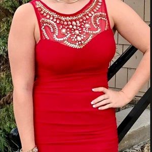 Red fitted beaded homecoming dress.